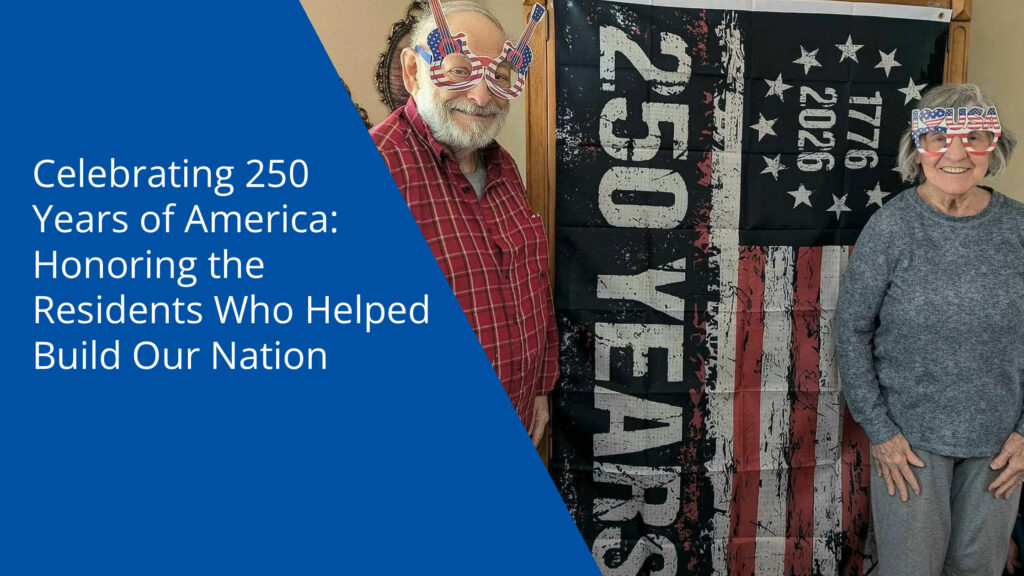 Two residents standing in front of an American flag, celebrating the United States' 250th Anniversary